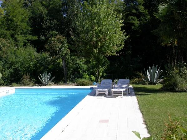 Villa con piscina e giardino vista lago 6